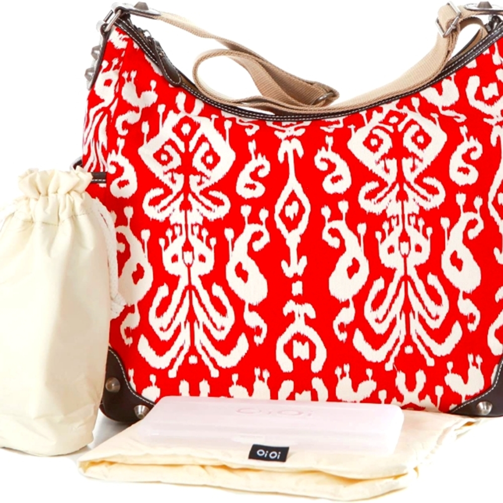 OiOi Nappy Bag with insulated milk bottle holder, changing mat and w/wiper box.